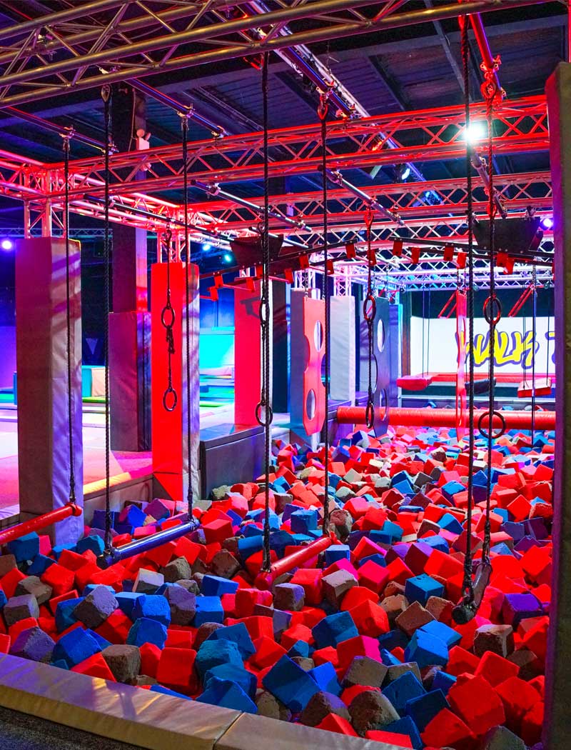 Children enjoying the indoor trampoline park at Bounce n Beyond